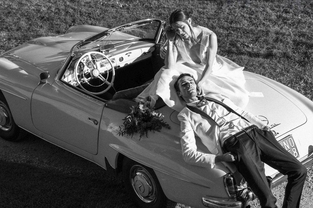 Bride and groom walking through the gardens of Castello di Celsa during a wedding in Tuscany, captured by a wedding photographer Tuscany.