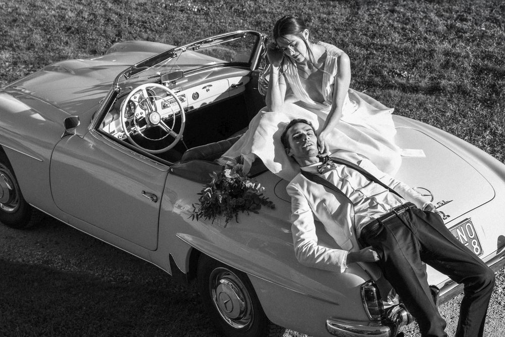 Bride and groom walking through the gardens of Castello di Celsa during a wedding in Tuscany, captured by a wedding photographer Tuscany.