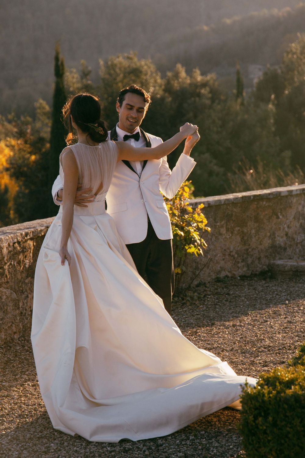 Elegant destination wedding in Tuscany at Castello di Celsa, featuring Renaissance architecture, Italian gardens and timeless photography