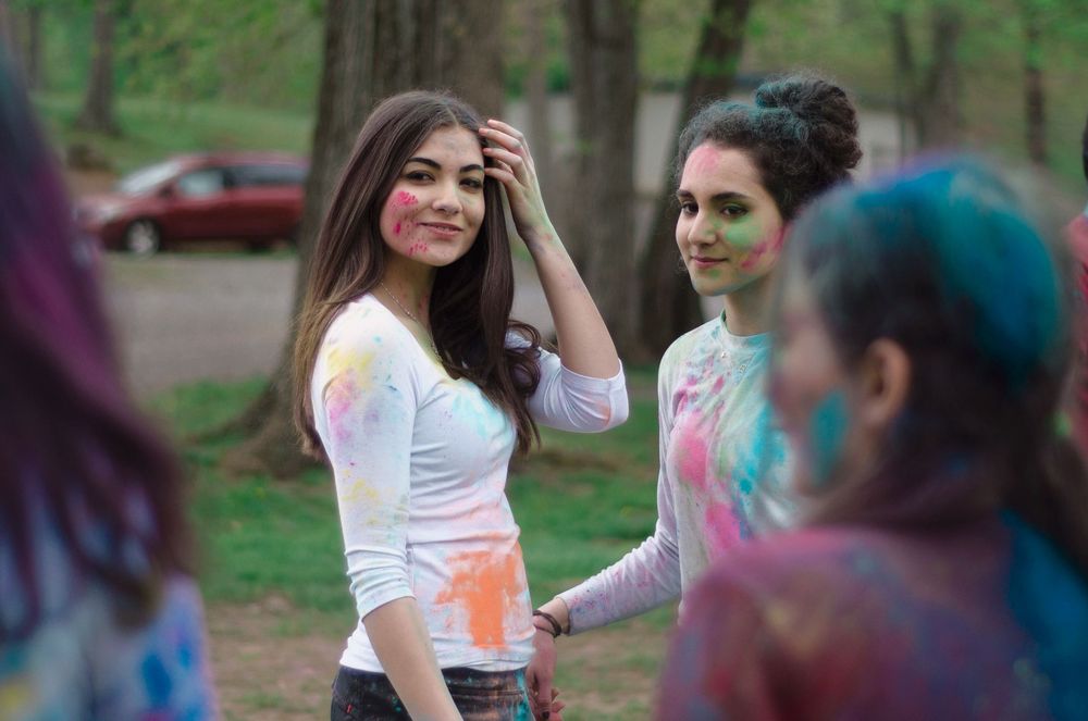 students at high school holi event