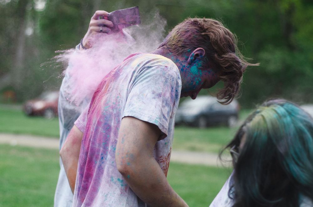 student at high school holi event