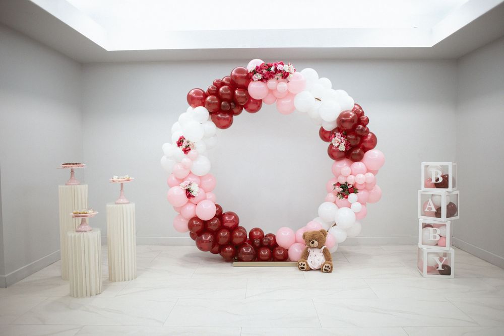 Decorations for photo booth at a miami baby shower. It's a girl!