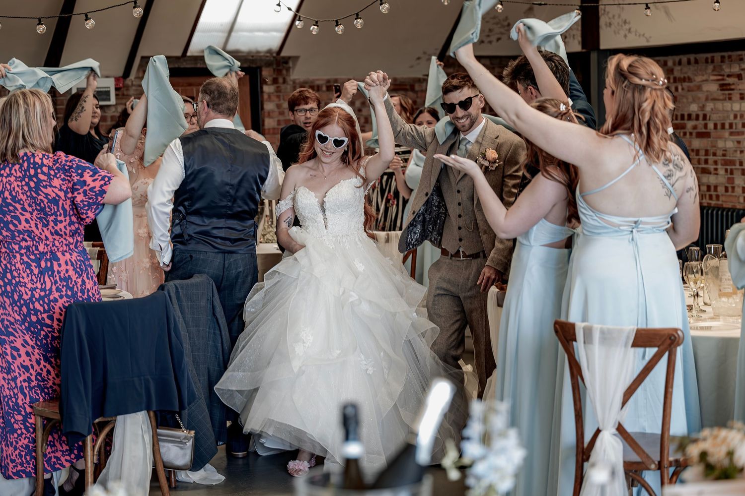 A Natural Beverley Barn reception entrance captured using a relaxed documentary approach.