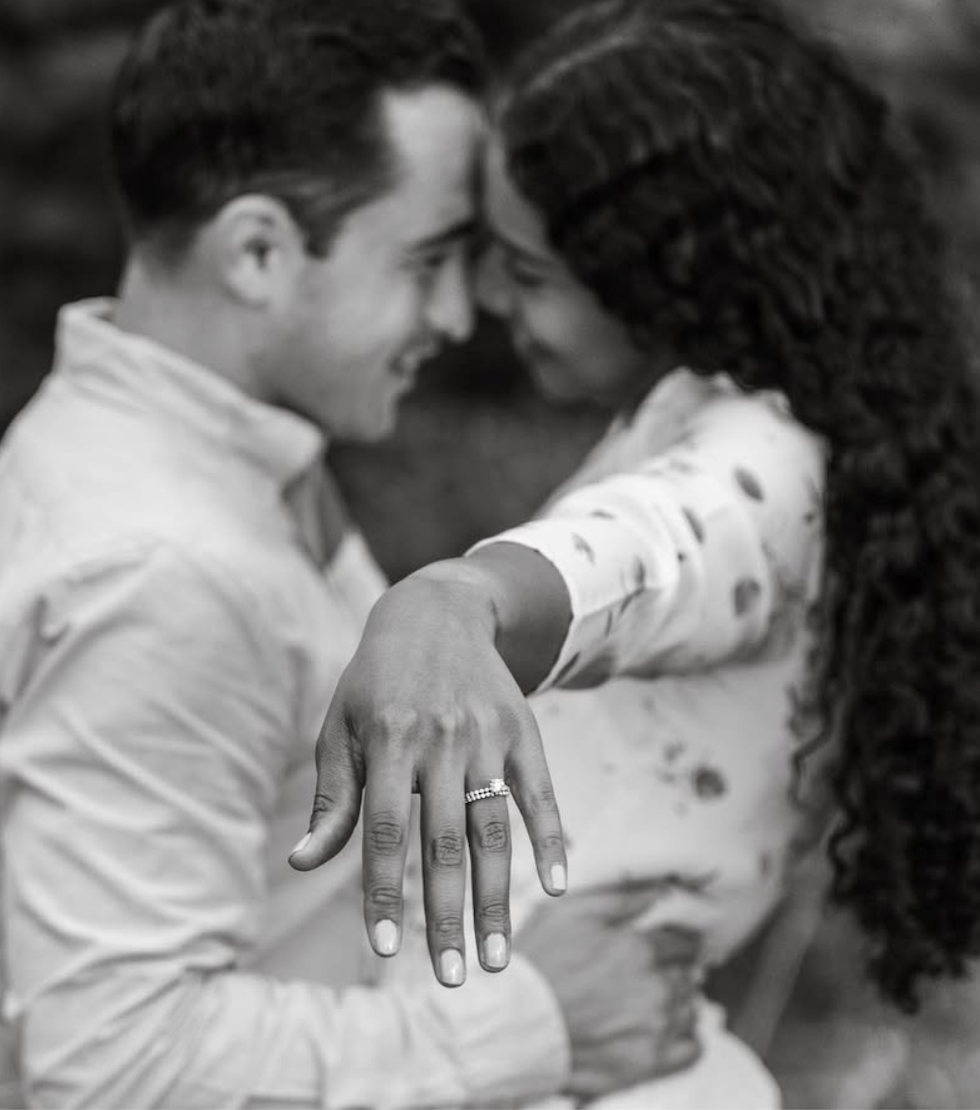 Engagement photo of fiance showing off her ring.