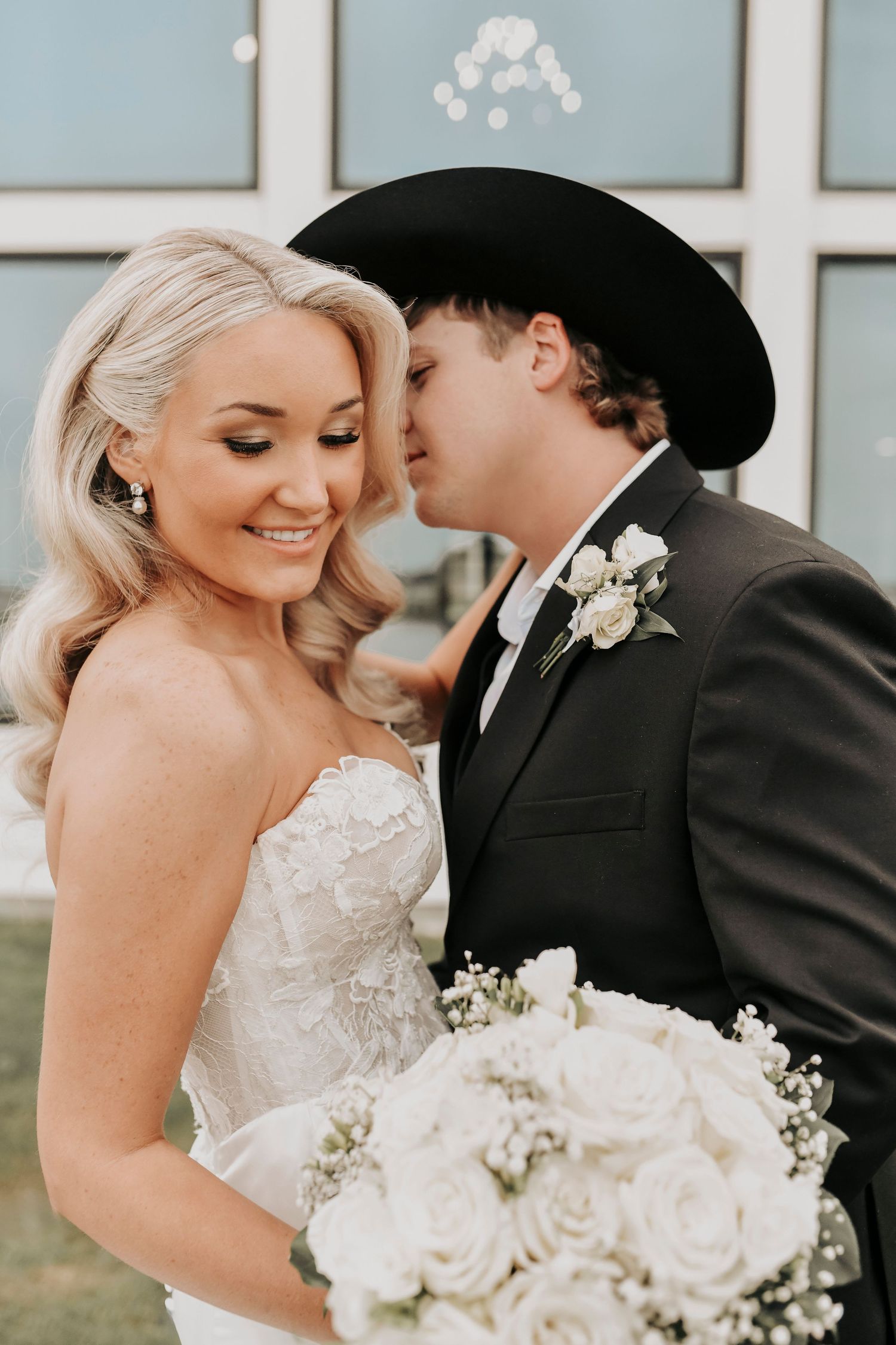 Elegant bridal portraits with wedding chapel backdrop