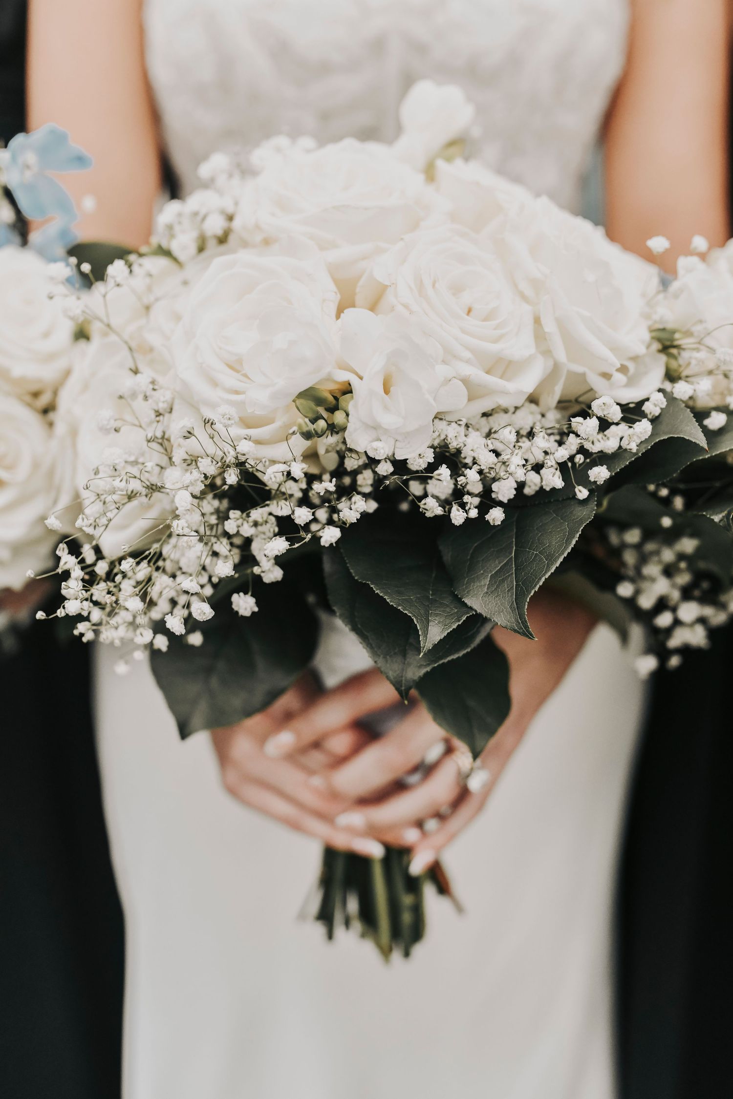 Bridal party gathered outside chapel after wedding ceremony