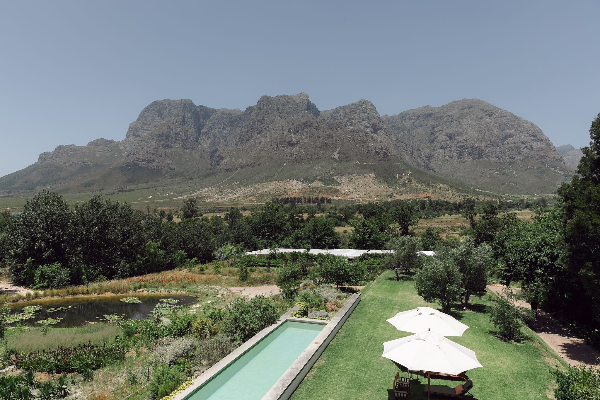 Pool at the villa next door at Johannesdal 1207 with elegant interiors and garden views