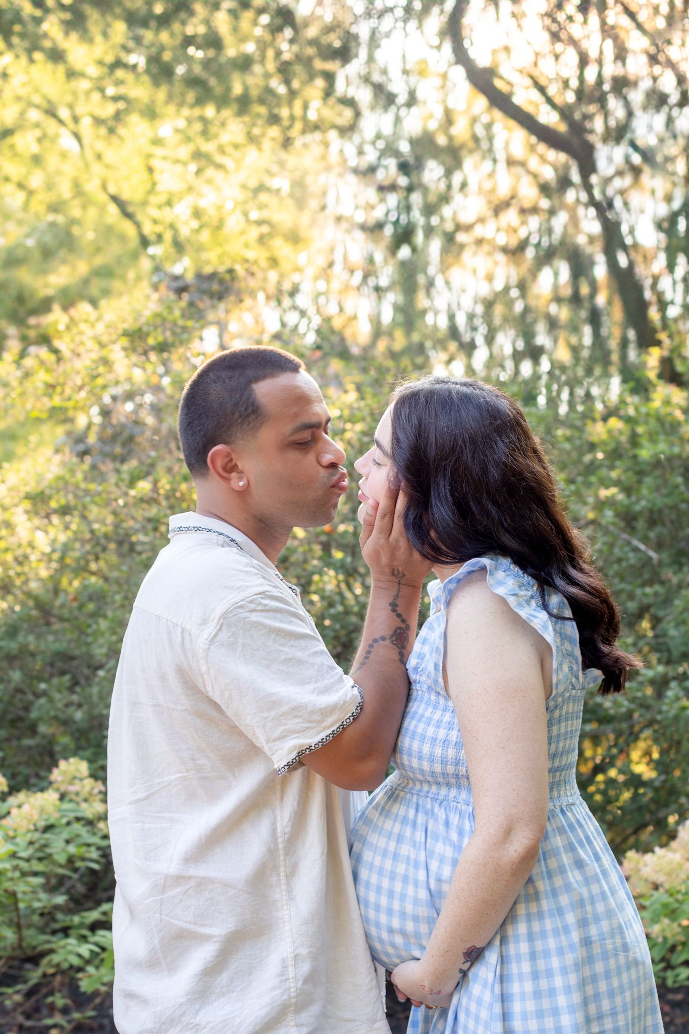 Cincinnati maternity session at Glenwood Gardens with professional portraits in lush gardens and natural light.