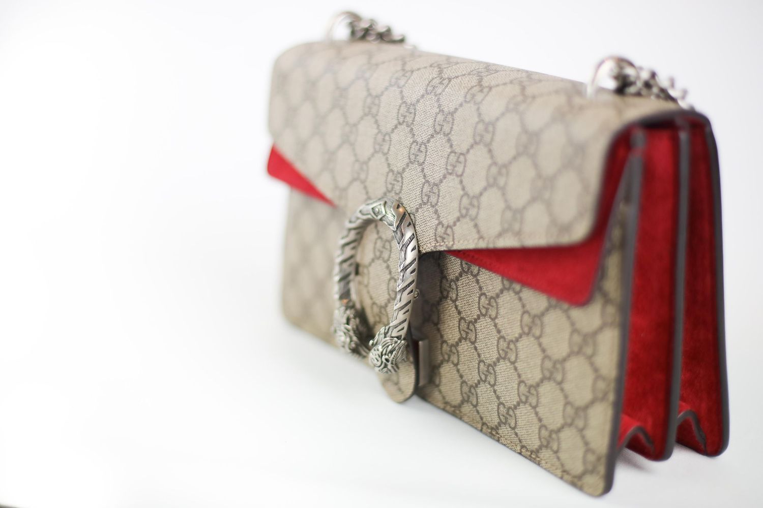 Designer beige monogram canvas clutch wallet with red leather interior and silver hardware shown in multiple angles.