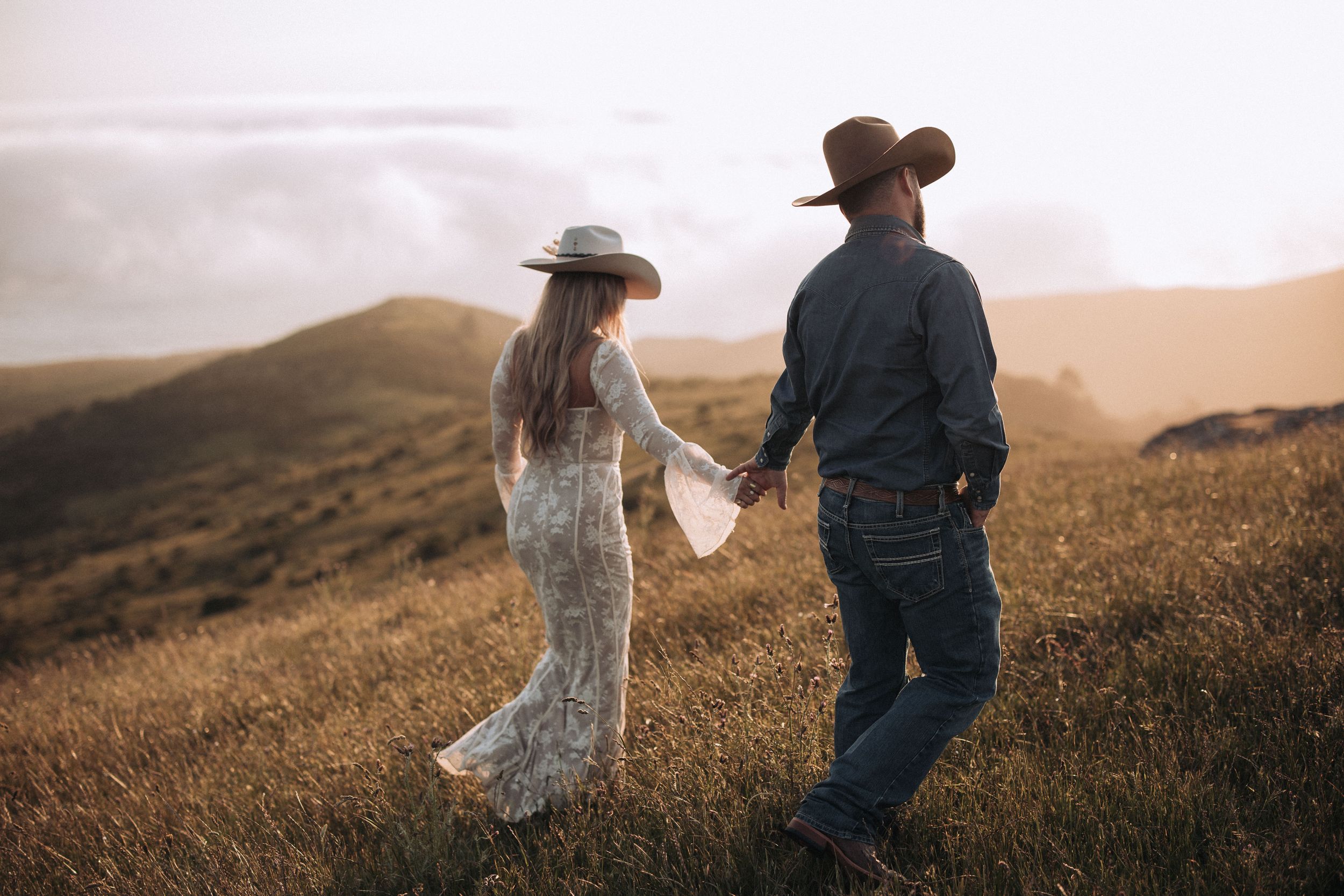 Couple embracing during an outdoor engagement session in North Idaho