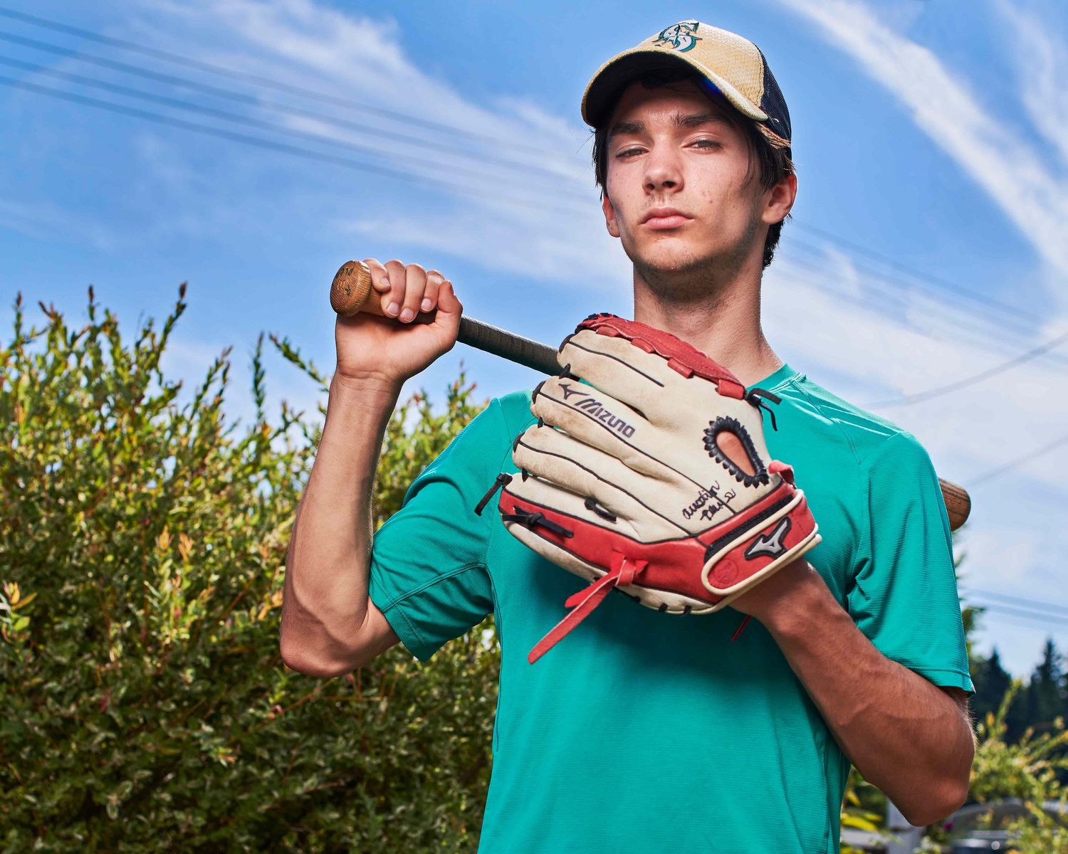 Finished portrait of high school student with several objects removed for baseball portrait