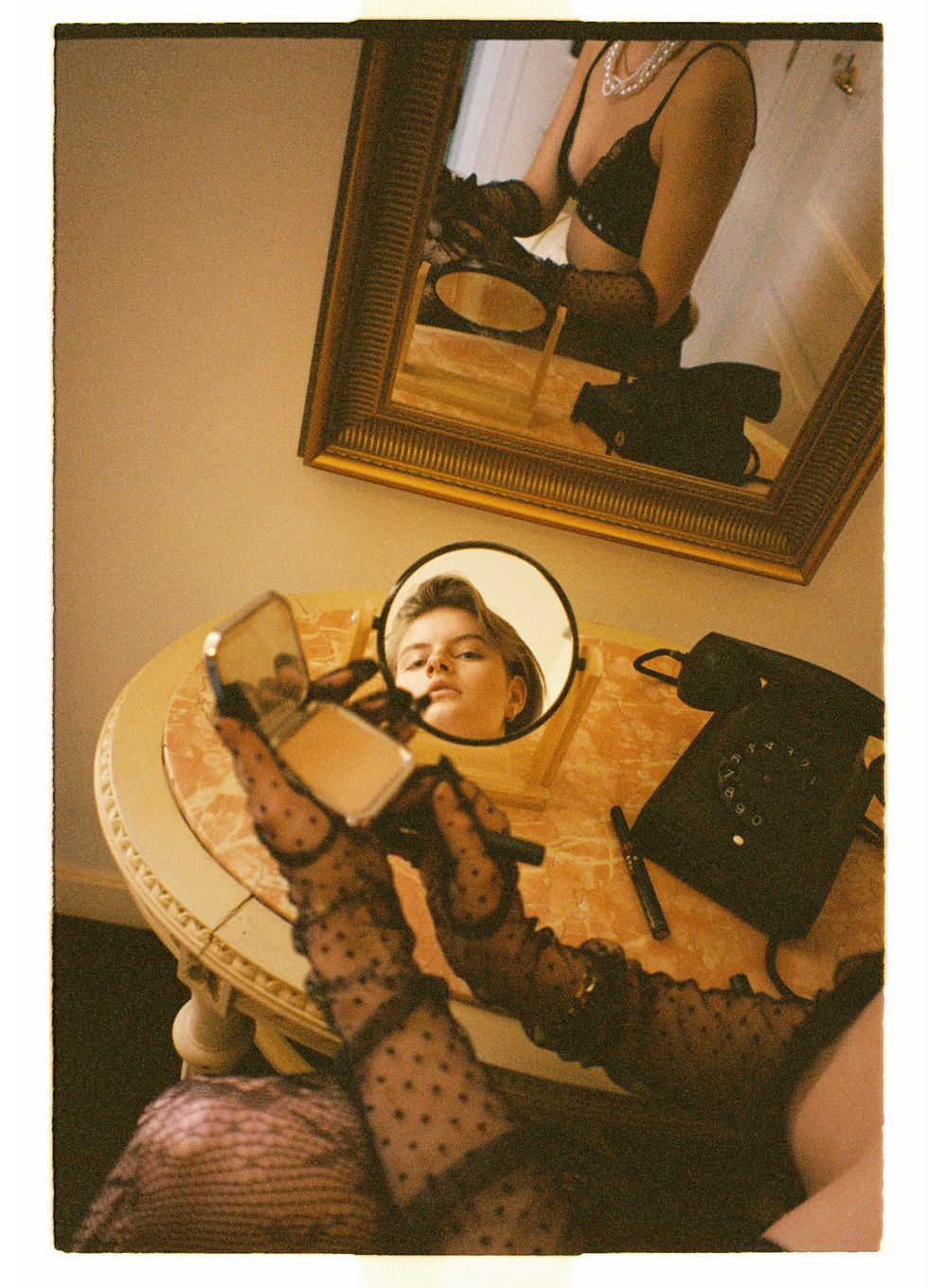 Vintage-style film photos of lingerie and accessories arranged on a surface.