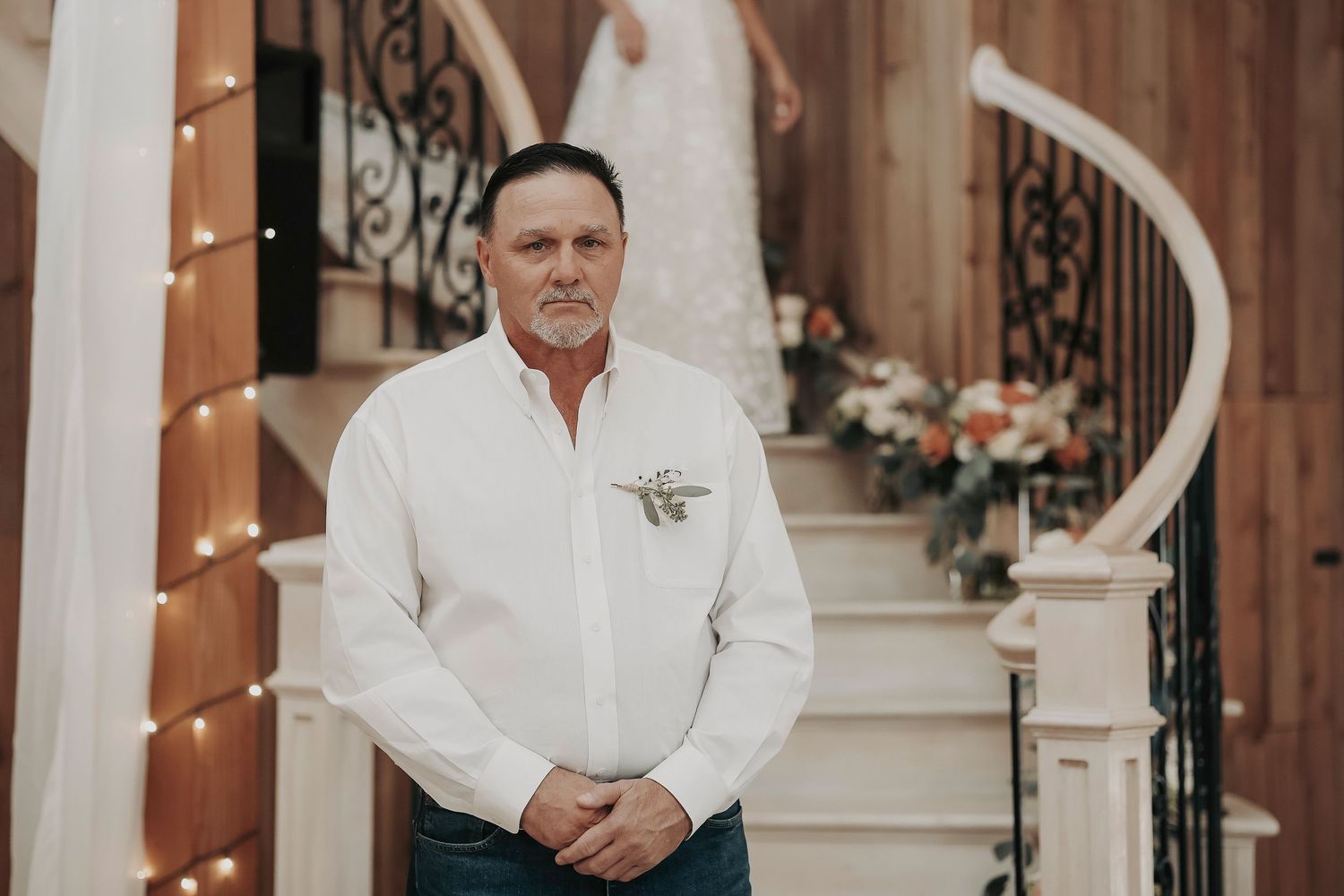 Bride coming down wooden stairs for first look with dad – April Pinto Photography
