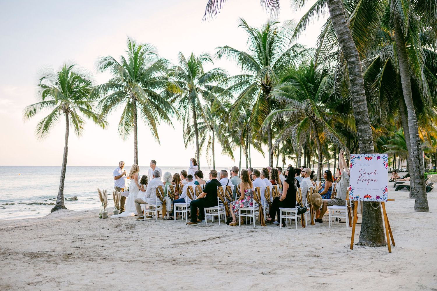 Emotional Riviera Maya wedding photo – romantic sunset vows exchange.