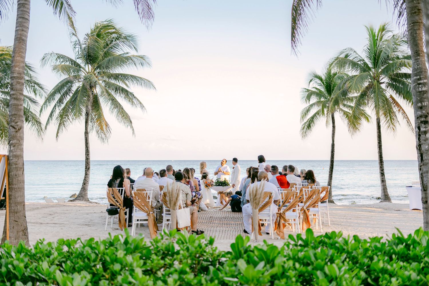 Emotional Riviera Maya wedding photo – romantic sunset vows exchange.
