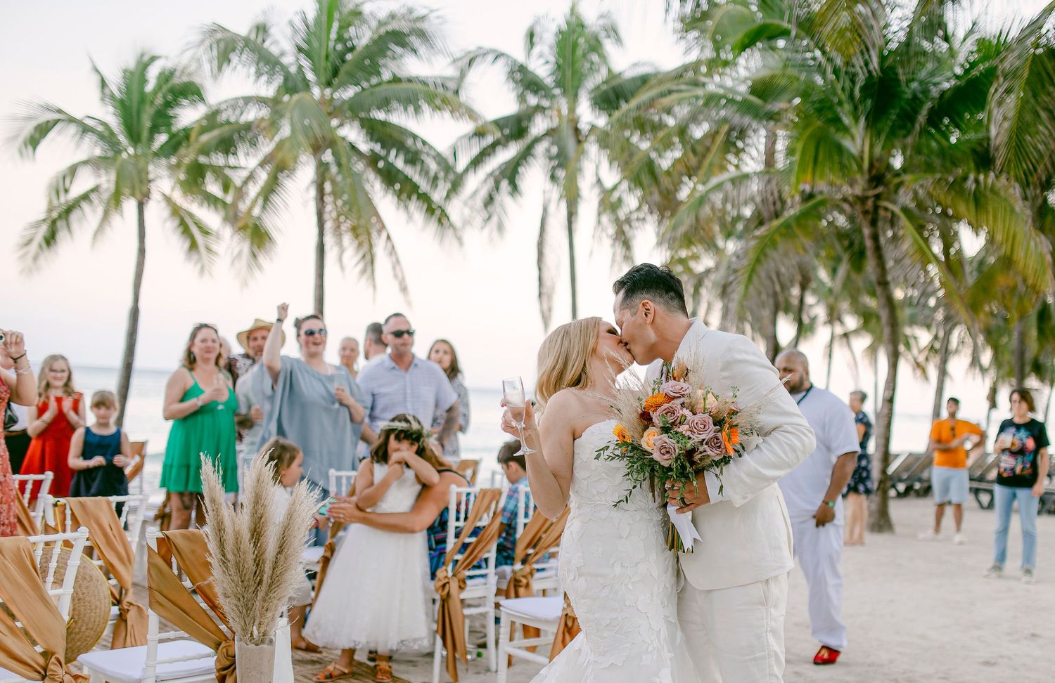 Emotional Riviera Maya wedding photo – romantic sunset vows exchange.