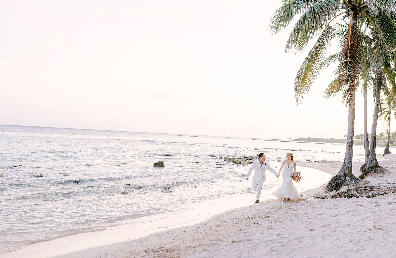 Emotional Riviera Maya wedding photo – romantic sunset vows exchange.