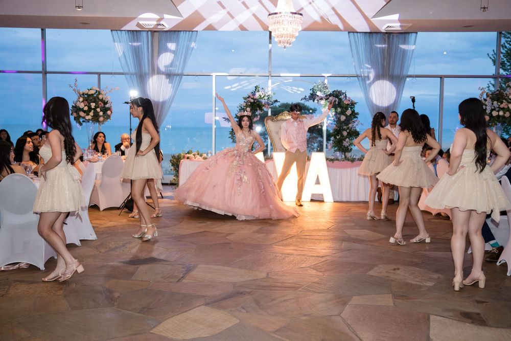 Quinceañera Anayya dancing at her XV celebration in Salon Latino. Professional event photography in Waukegan, IL by Alex T Photography.