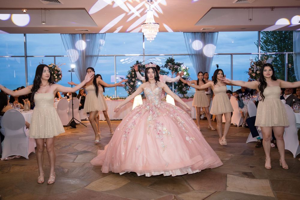 Anayya performing her grand waltz with the court of honor. Quinceañera reception photography at Salon Latino by Alex T Photography.