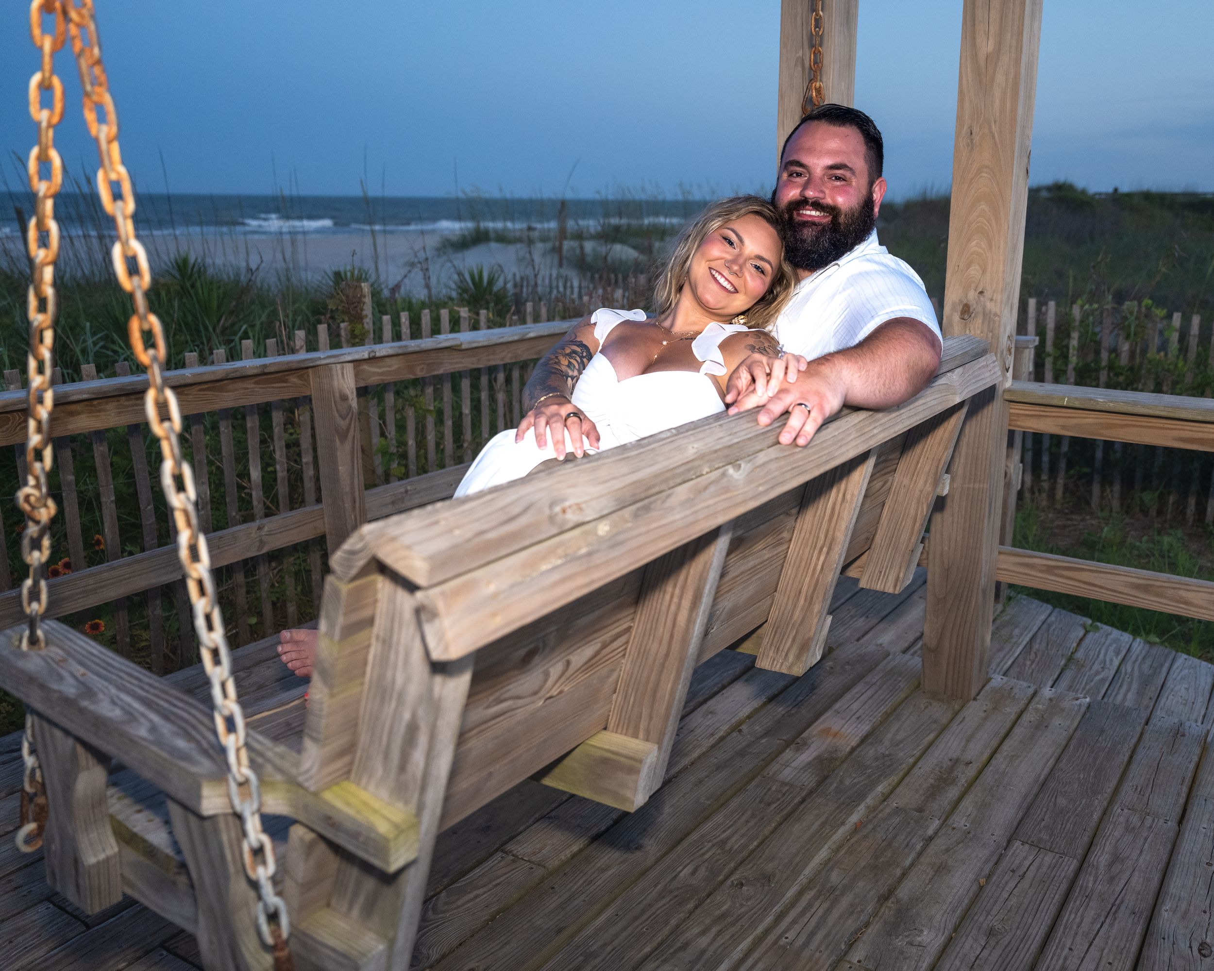 Four sequential photos showing people relaxing and enjoying themselves on a wooden porch swing at sunset.