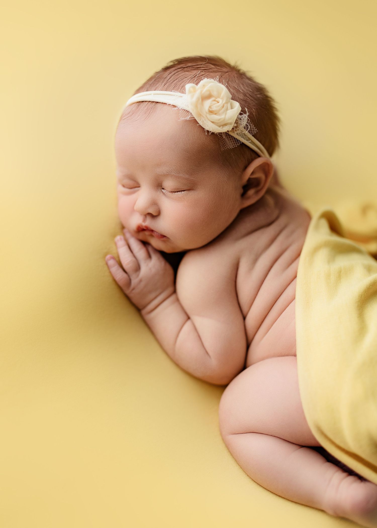 Professional newborn photographer serving Portsmouth, Ohio, Huntington, WV, and surrounding Tri-State communities.