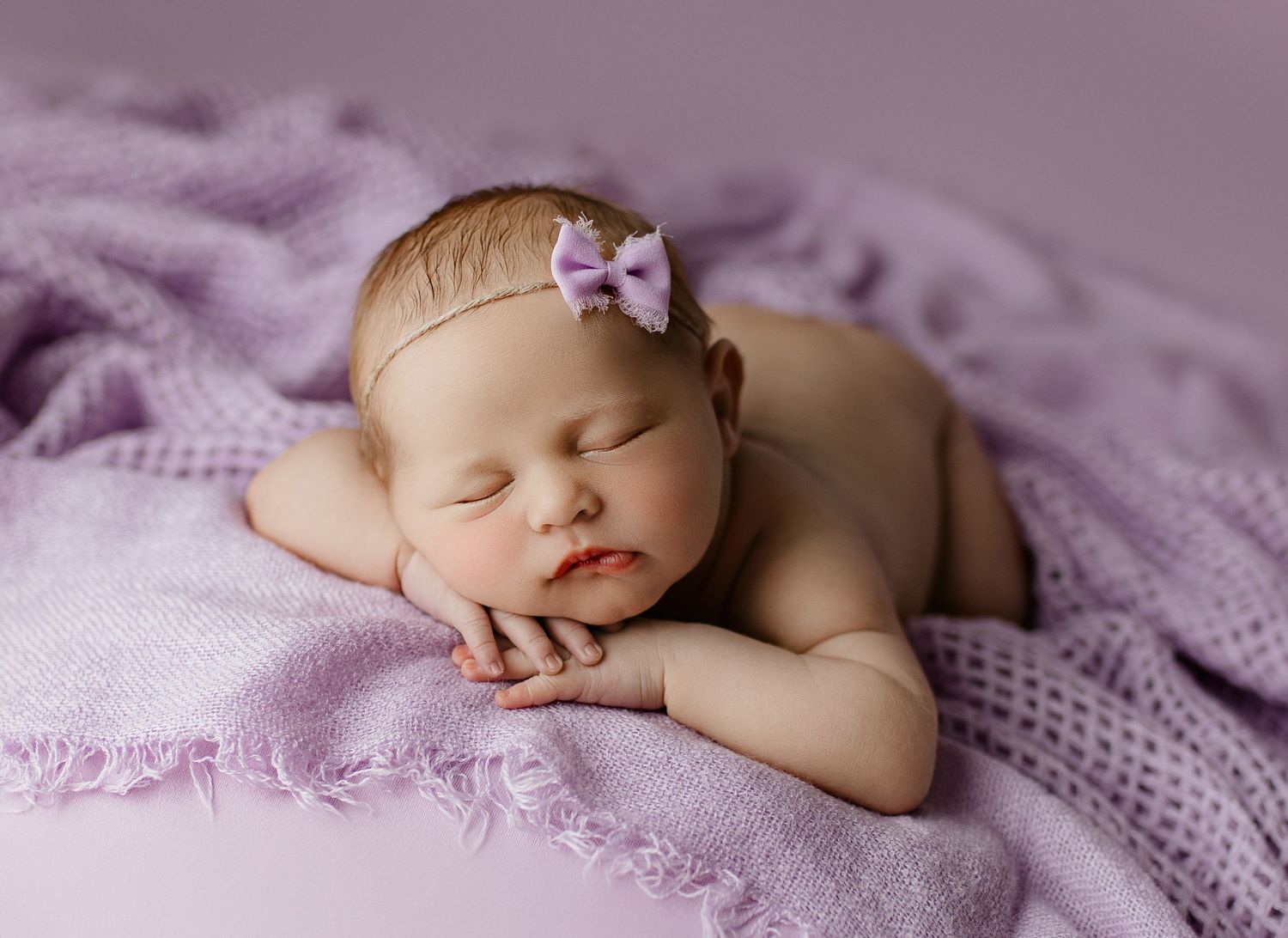 Professional newborn photographer serving Portsmouth, Ohio, Huntington, WV, and surrounding Tri-State communities.