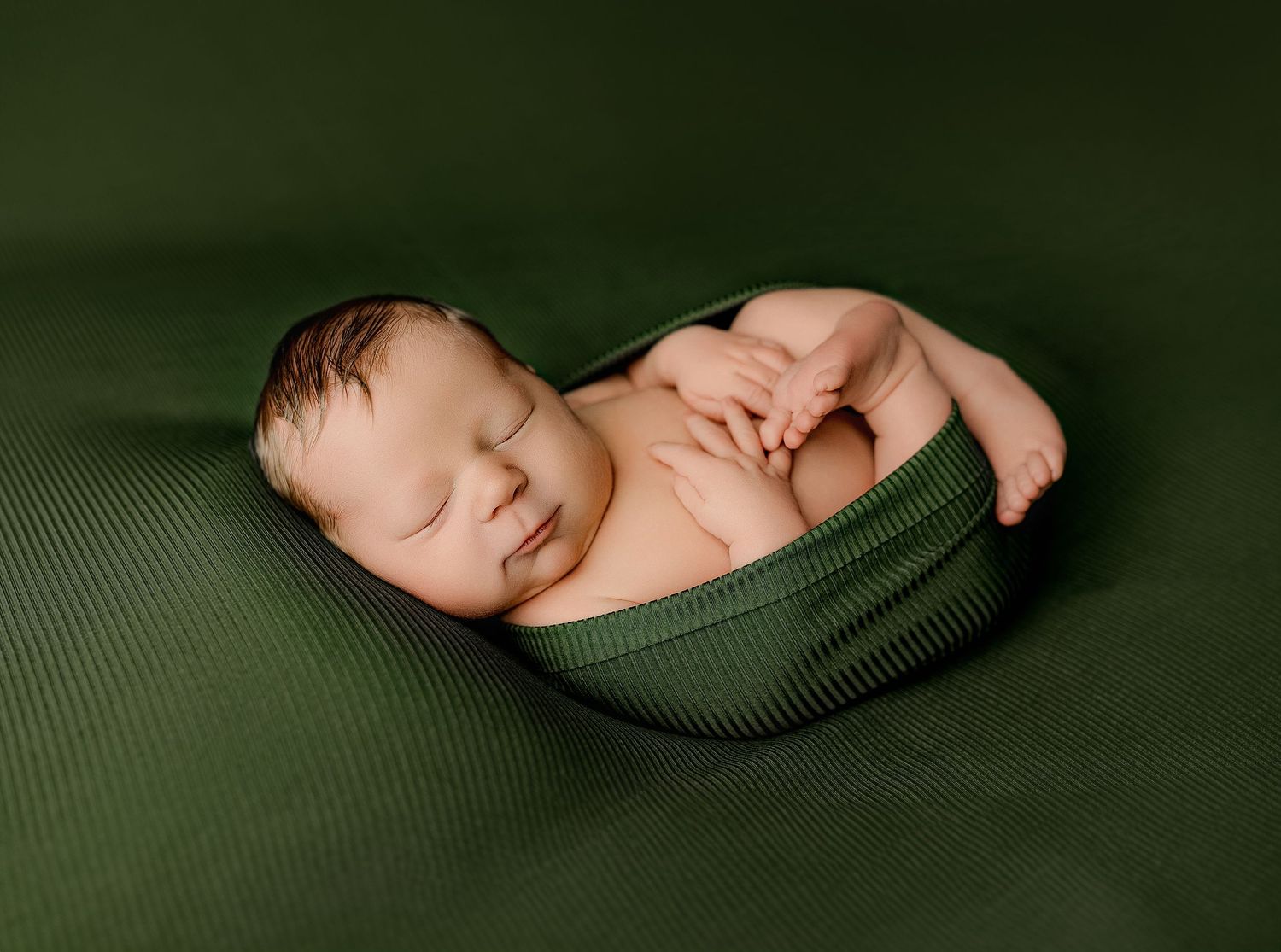 Bailey's Photography | Ironton OH | Newborn in Bucket with Fur | Rustic Baby Photo