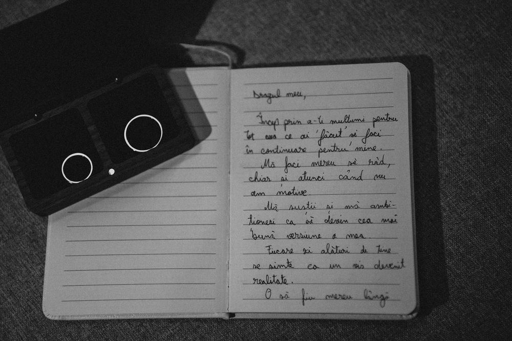 Handwritten notes on lined paper cards photographed in black and white.