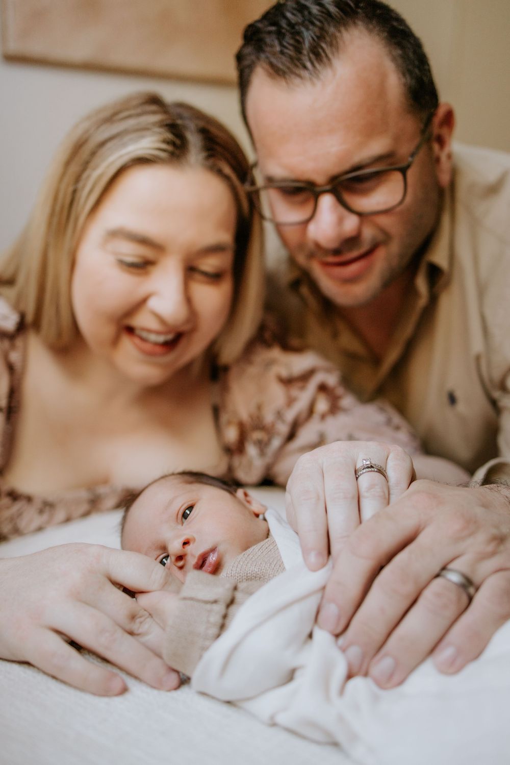 Relaxed in-home newborn photo session with natural poses in Adelaide