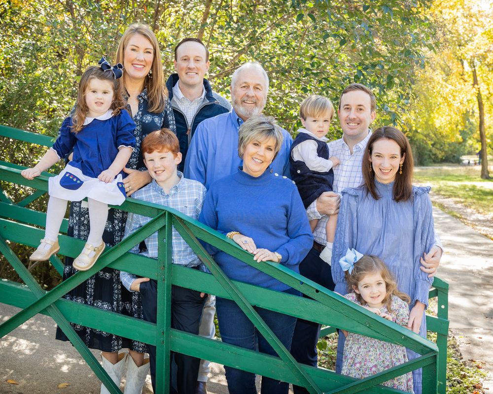 Happy family on a bridge