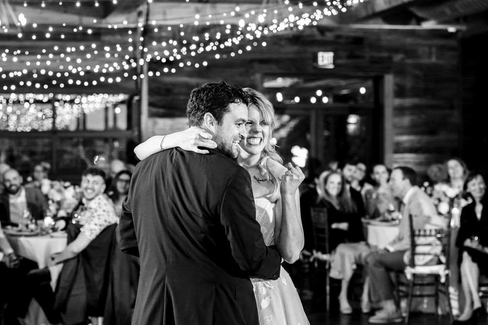 Wedding reception venue decorated with twinkling string lights creating a romantic atmosphere.