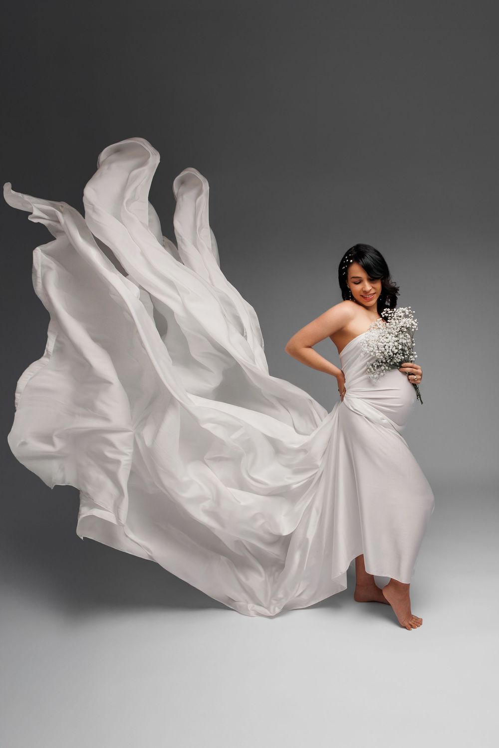 Luxury maternity photography in Chicago & suburbs featuring timeless studio and lifestyle portraits of expecting mothers.