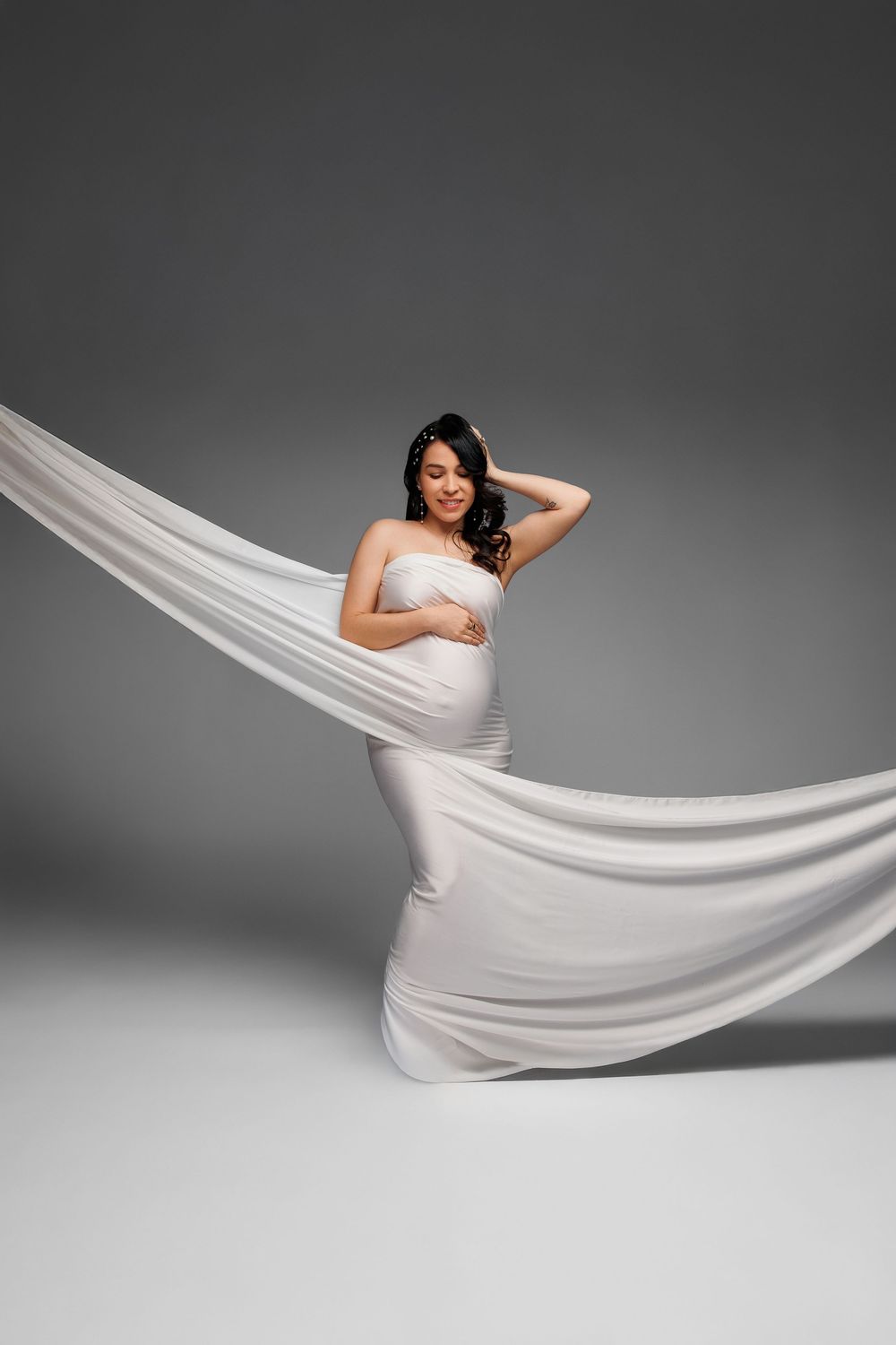 Luxury maternity photography in Chicago & suburbs featuring timeless studio and lifestyle portraits of expecting mothers.