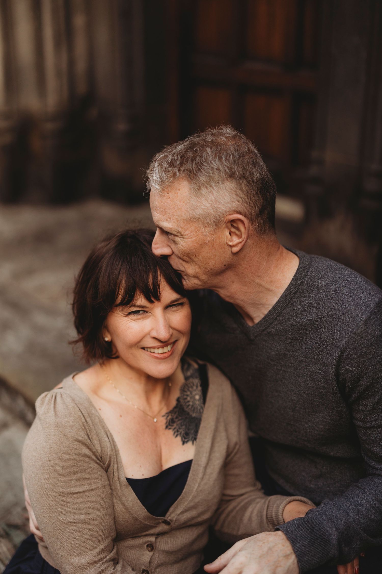 Romantic senior couple sharing tender moments together in a series of candid photographs.