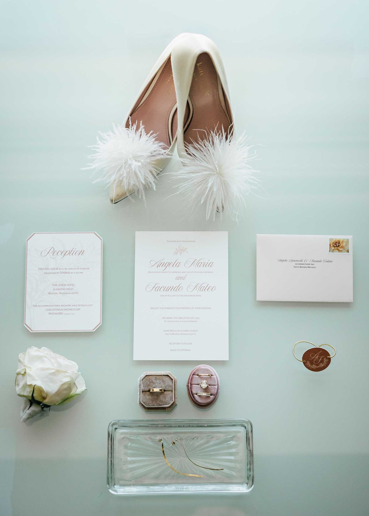 Bride’s wedding shoes with feather details and diamond engagement ring photographed during Boston wedding preparations