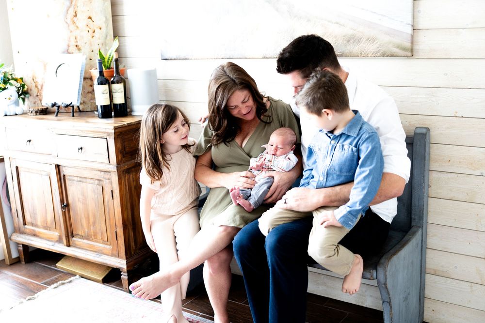 A series of connected photos showing a family relaxing together in casual moments at home.
