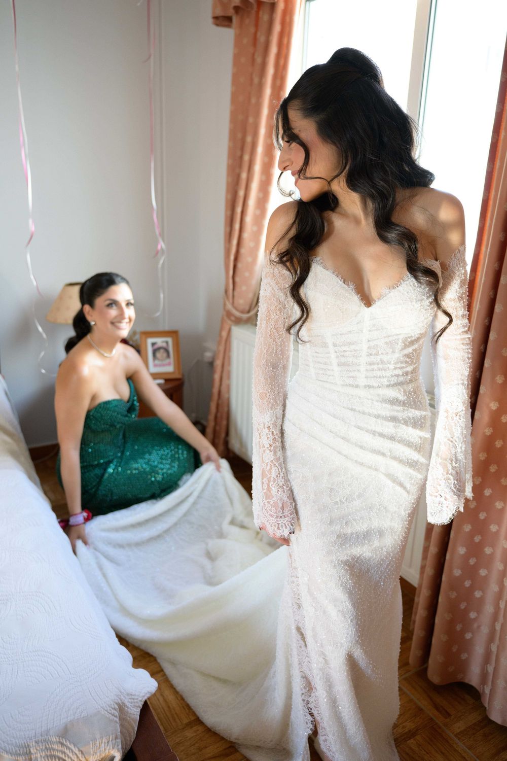 A series of photos showing a bride in a white wedding dress and another person in an emerald green dress.
