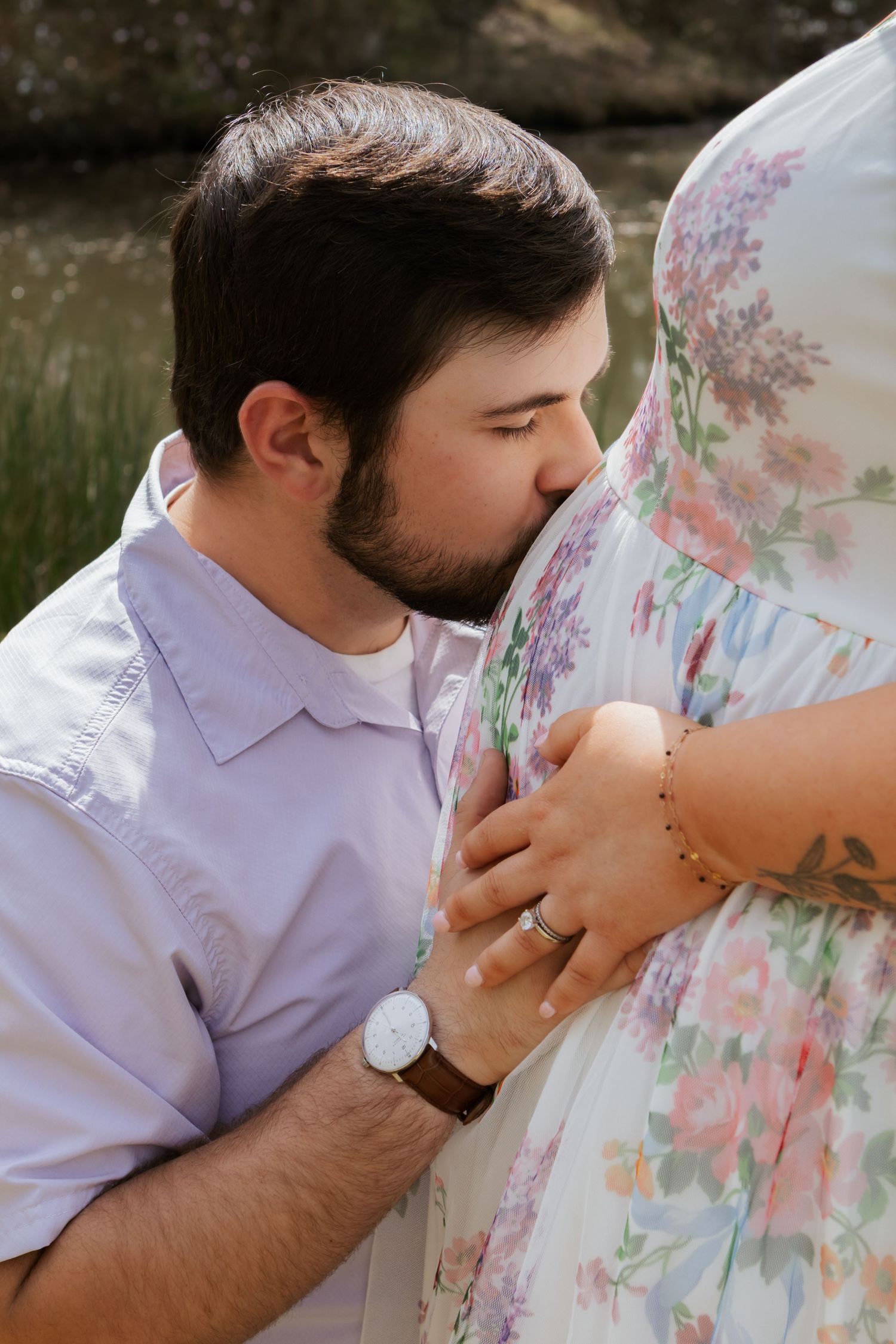 A romantic sequence of someone kissing a hand wearing a floral dress, captured in multiple progressive shots.