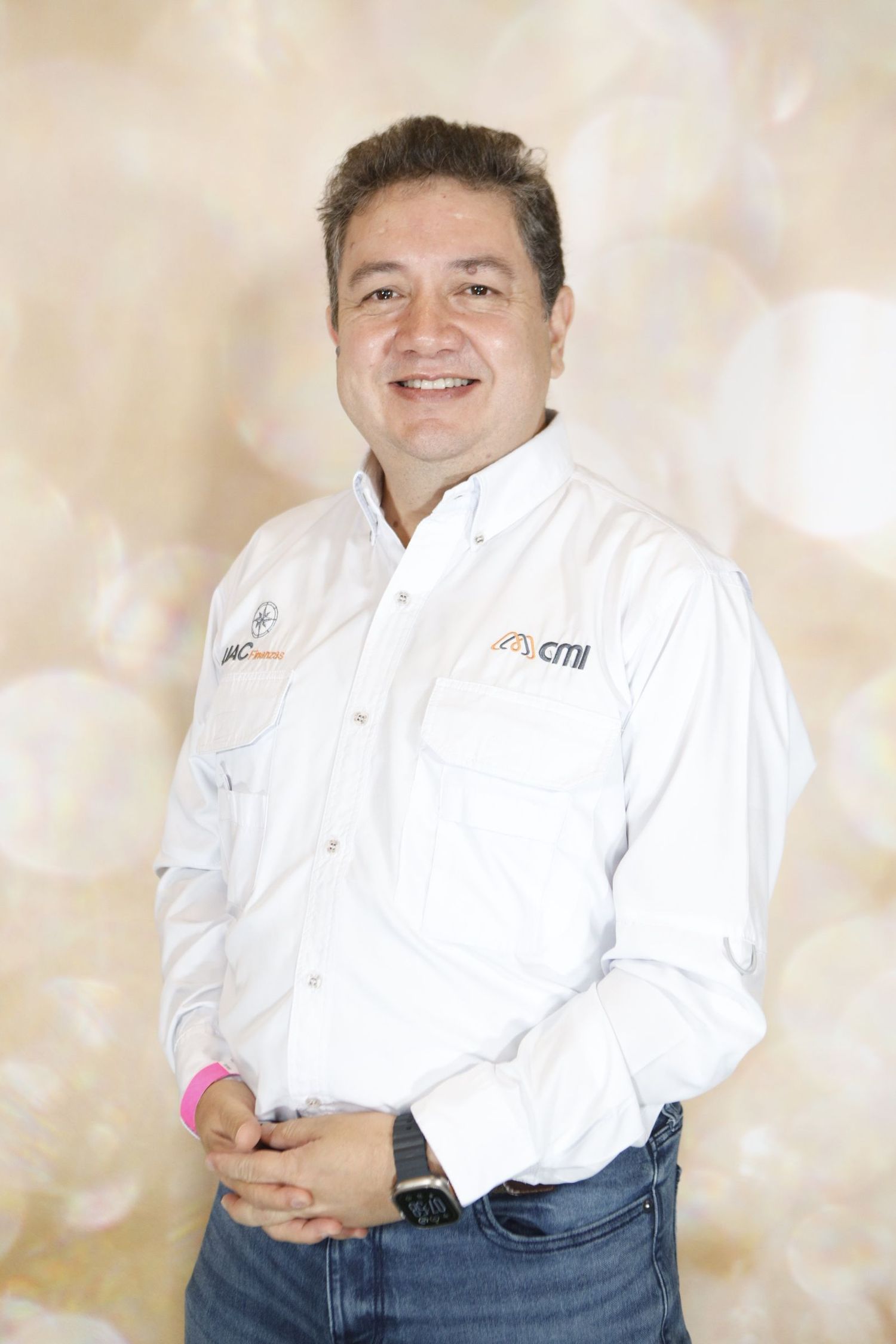 Professional headshot portraits of a person in a white dress shirt against a light background.