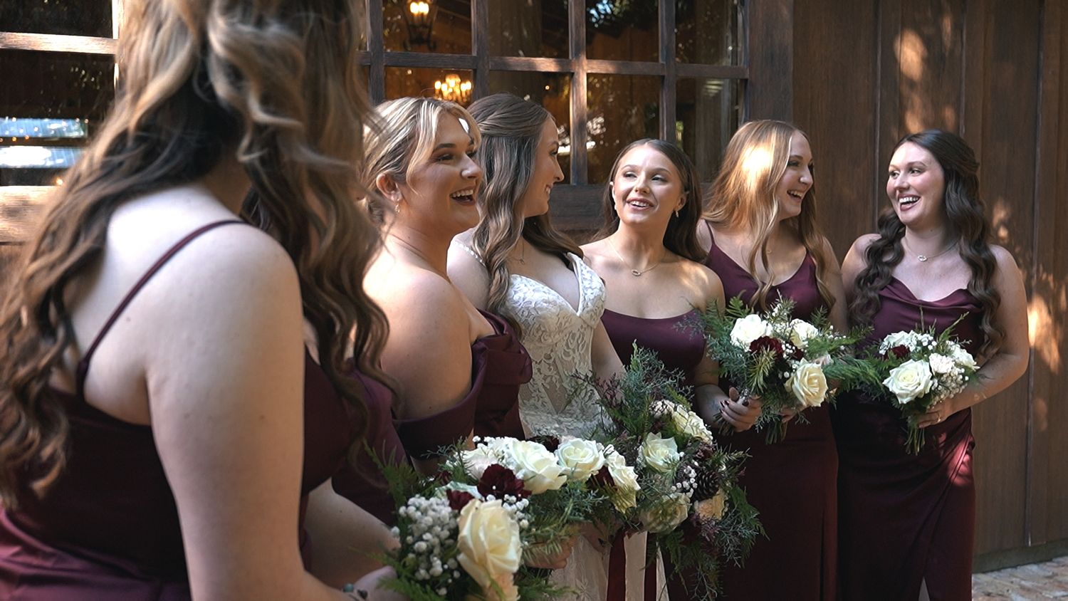 Bridal Party laughs at elegant barn wedding in Central Florida