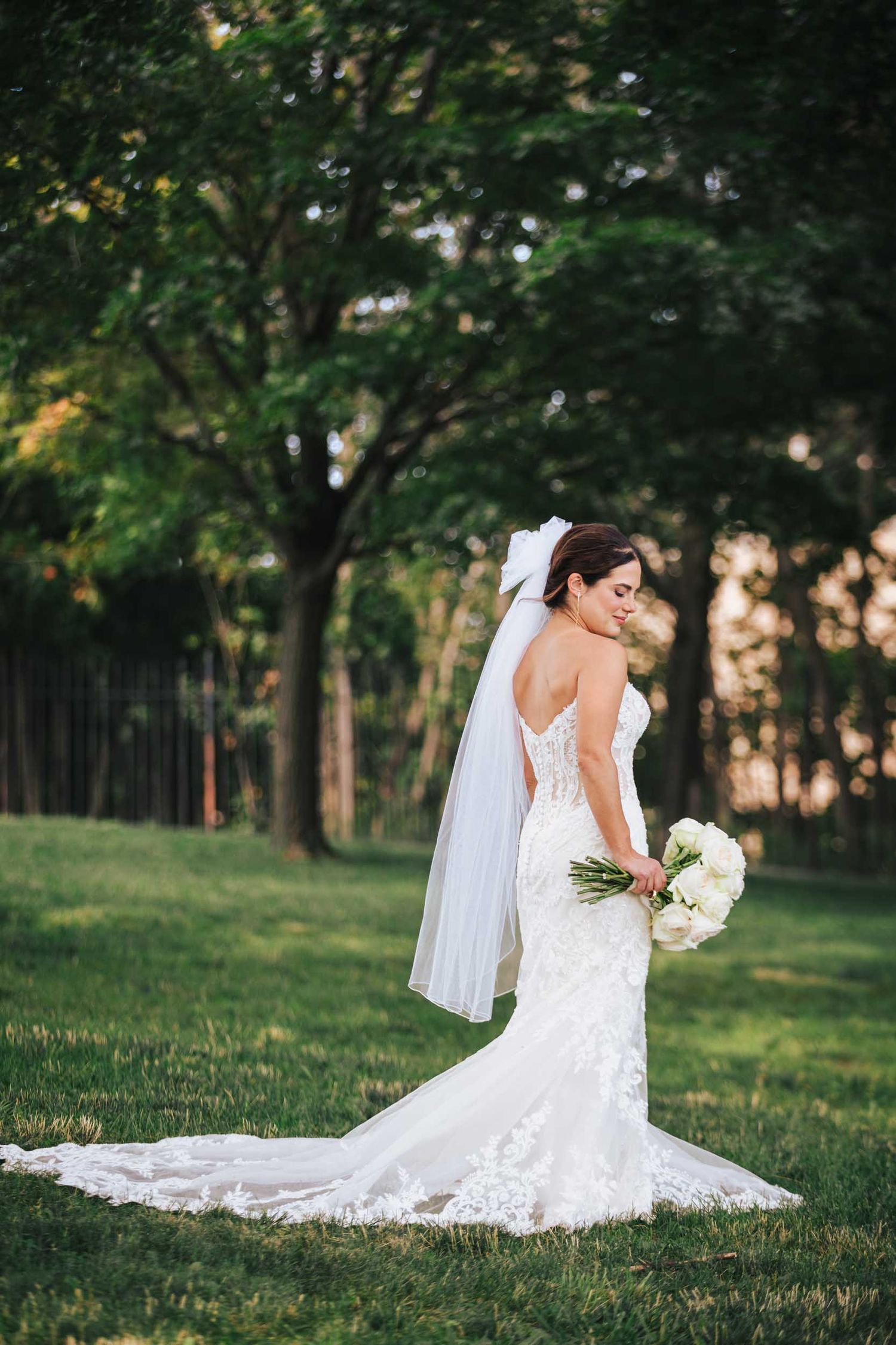 Bride posing for a bridal portrait at Dorchester Heights park in South Boston