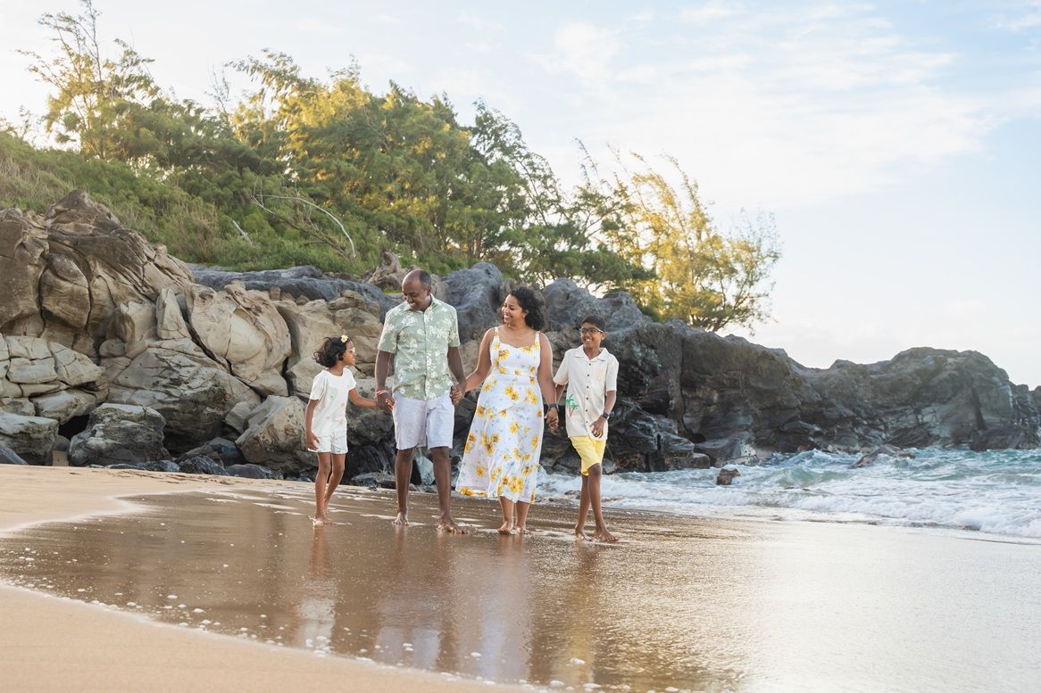 Maui family photographer photo against beautiful Maui sunset beach by ohwowfotos.