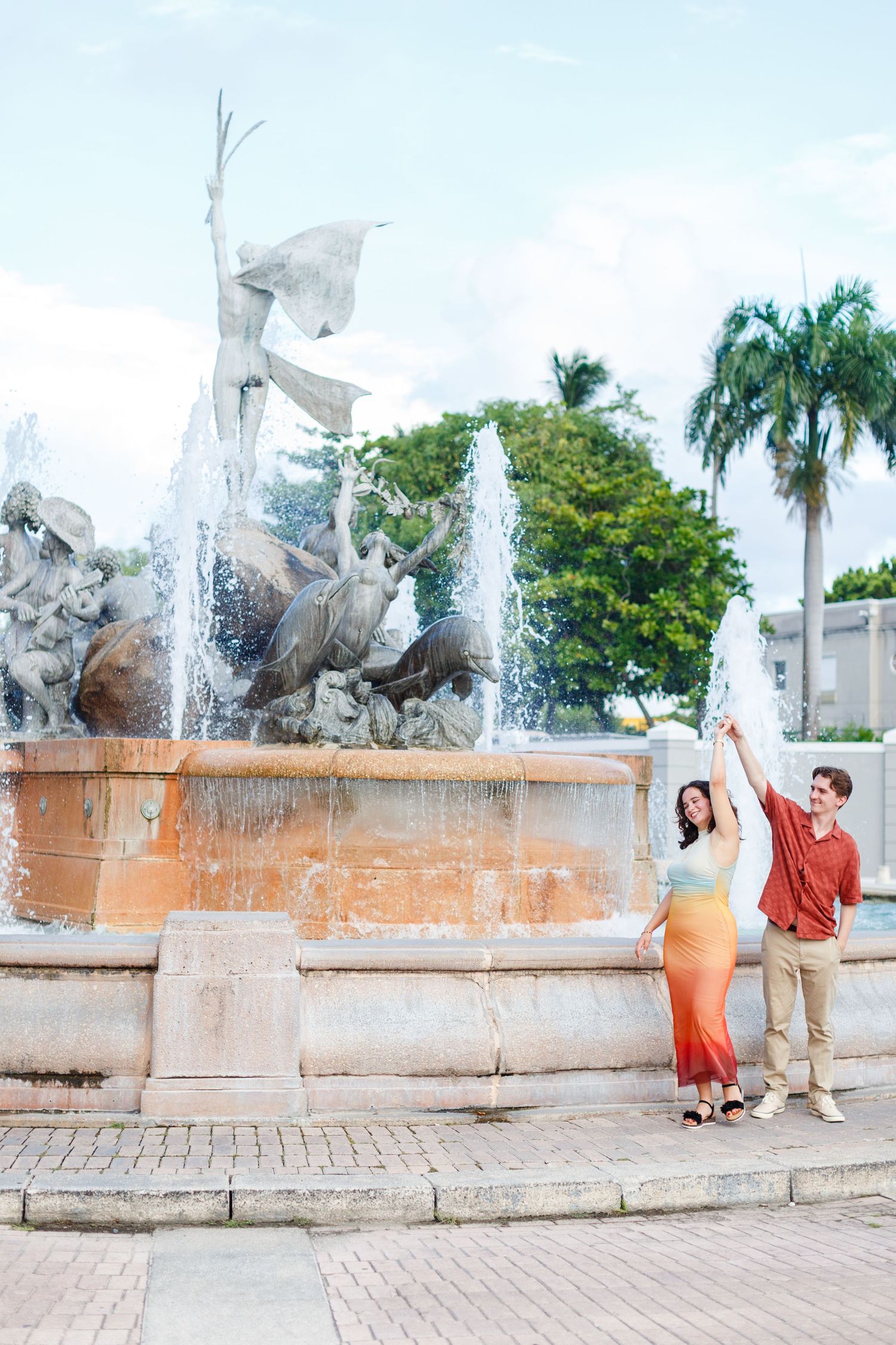 Surprise marriage proposal in Old San Juan, Puerto Rico. Paseo de la Princesa. Man and woman.