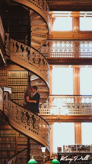 engagement photos of iowa couple in des moines library