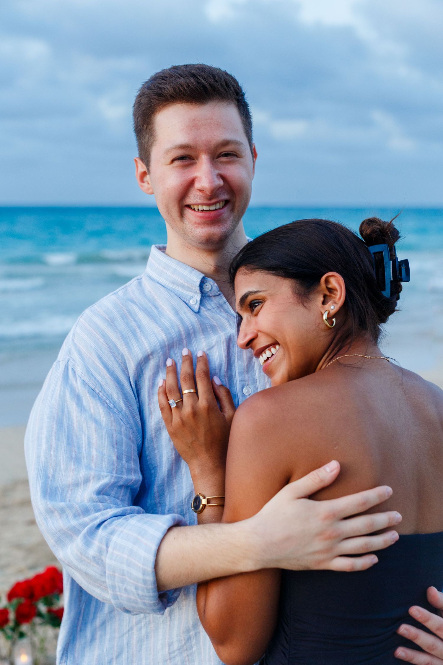 Couples portrait. Marriage proposal on the beach in Isla Verde, Carolina, Puerto Rico.