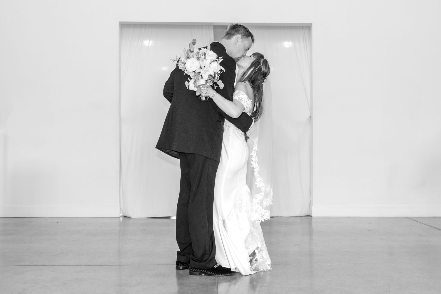 Black and white series of intimate wedding dance photos showing tender moments between bride and groom on the dance floor.