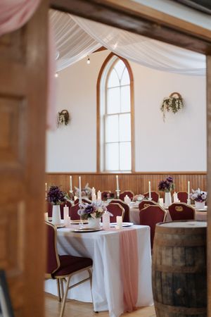 Romantic pink and red wedding decor at Mountain Rose Lodge, Moncton wedding photography, colourful wedding decor, fine art photography
