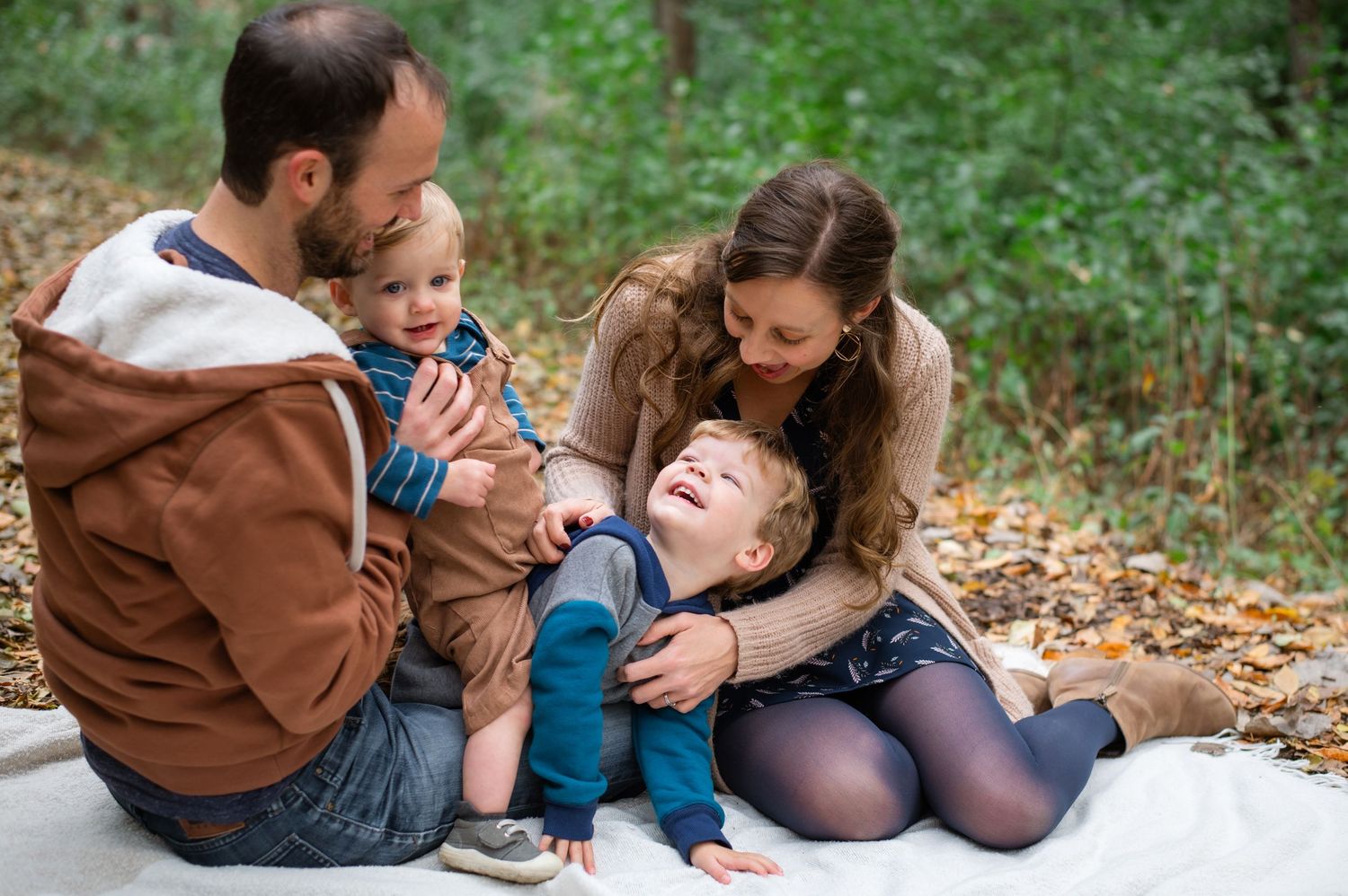 A group poses together outdoors while sharing warm embraces and smiles in a row of candid shots.