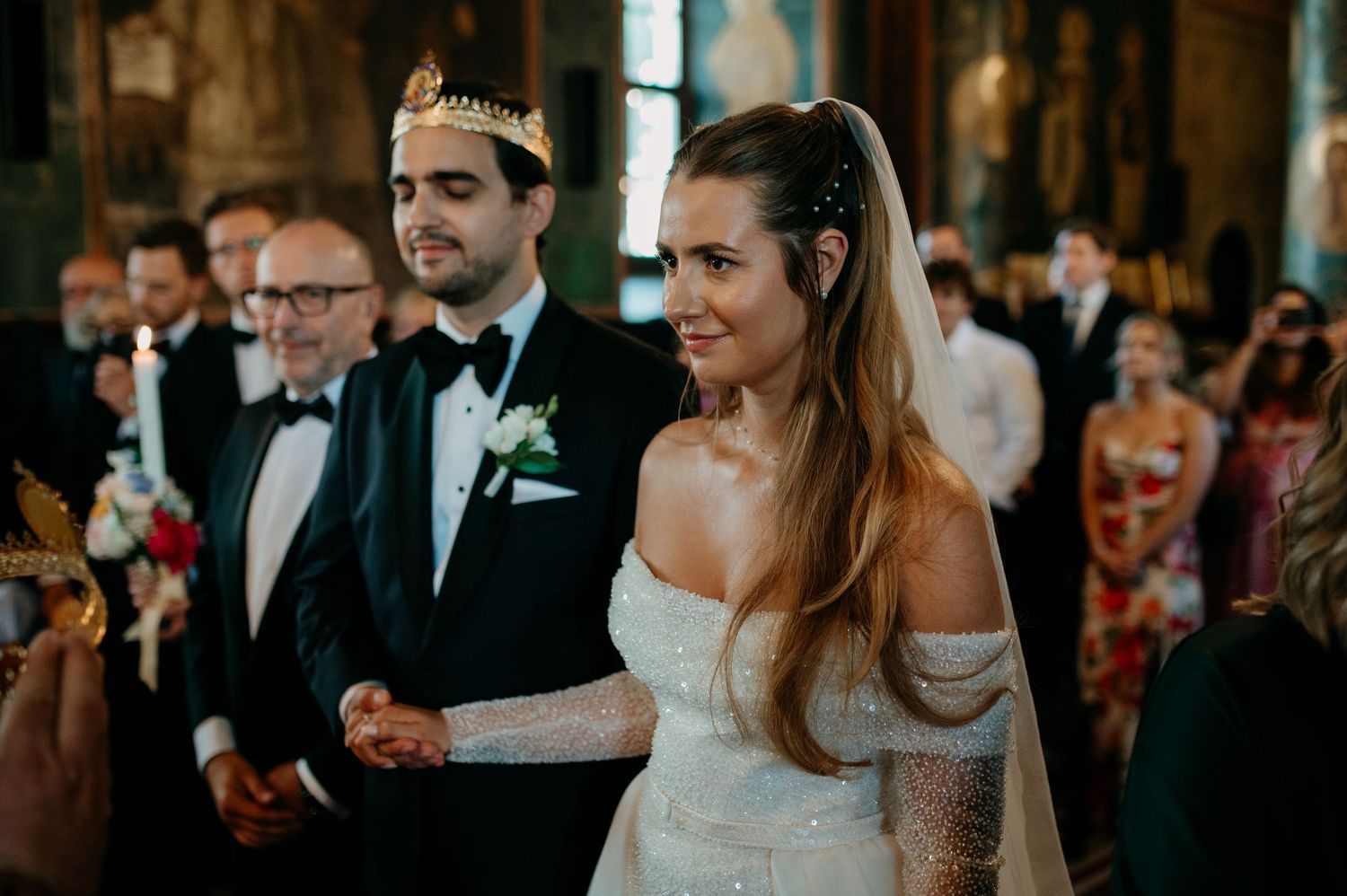 Bride and groom standing before the altar during their religious wedding ceremony