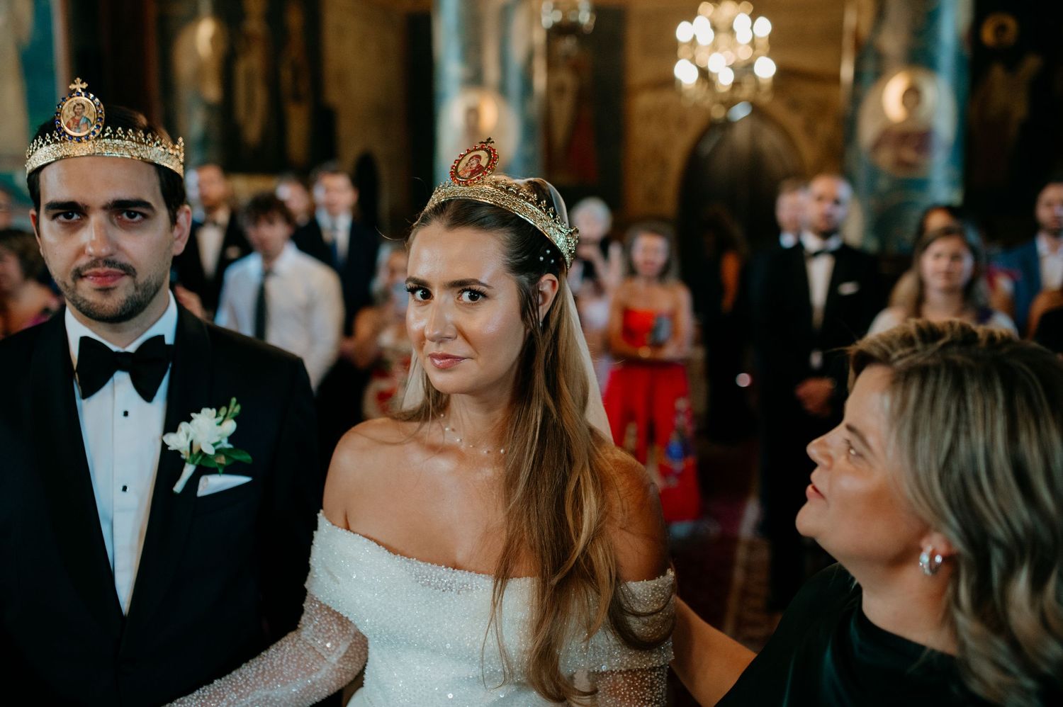 Bride and groom standing before the altar during their religious wedding ceremony